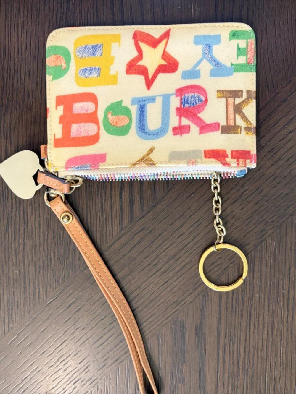 White Dooney & Bourke Wristlet with Multicolored Decor